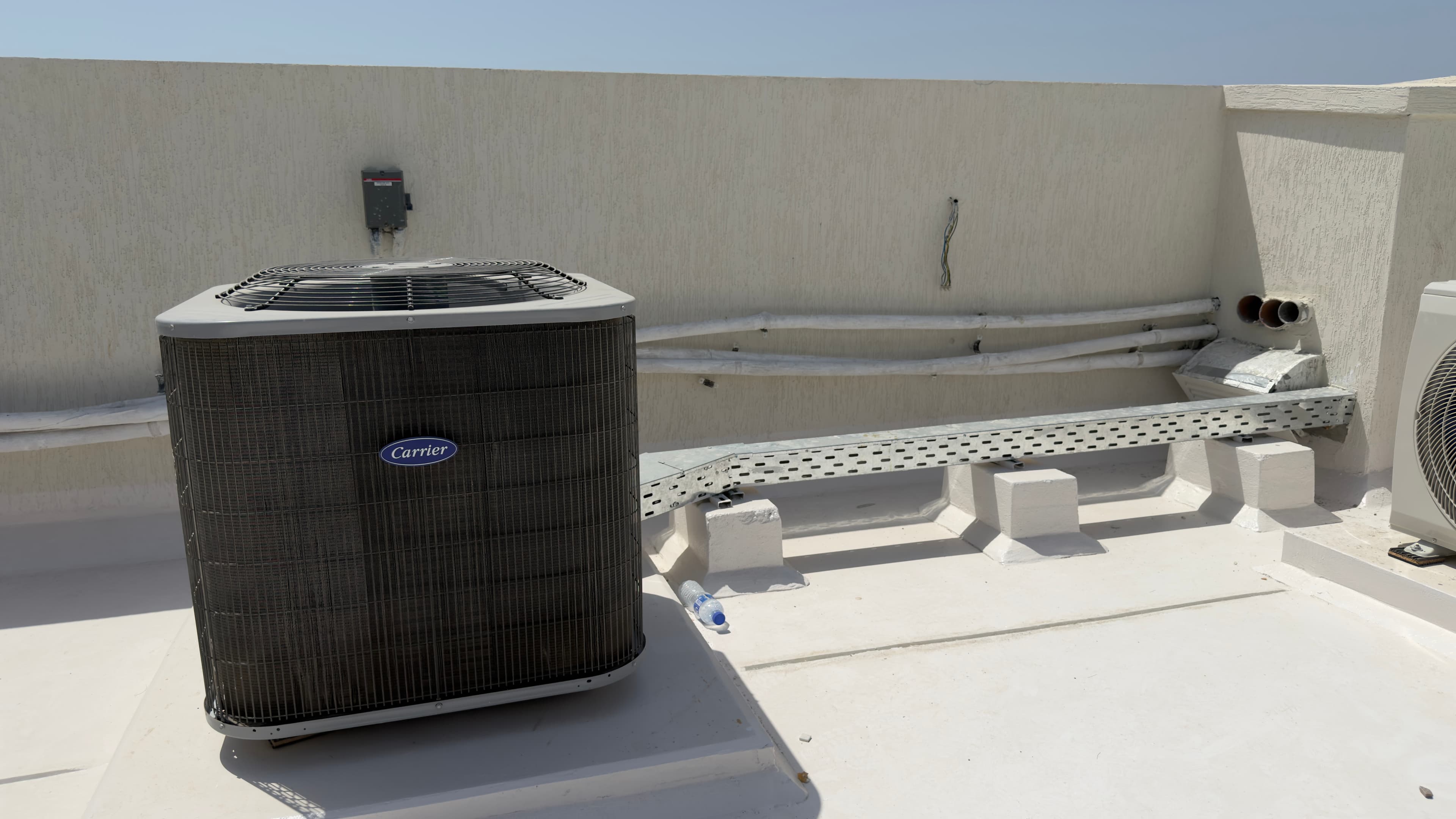Insulated rooftop ductwork installation for fresh air ventilation in Dubai by AGEC